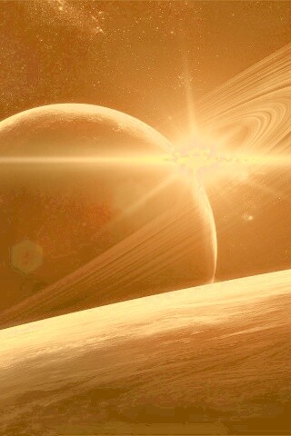 Солнце сквозь кольца Сатурна обои