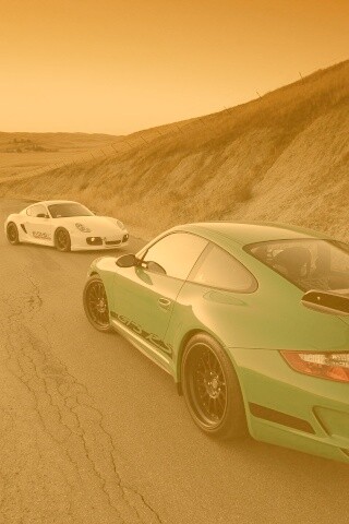 Два порша на горной дороге обои