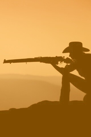 Стрелок на закате обои