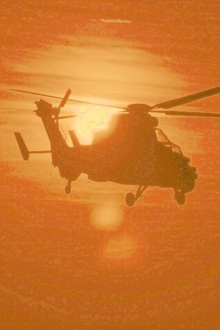Вертолет в лучах закатного солнца обои
