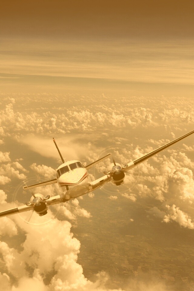 Самолет над облаками обои