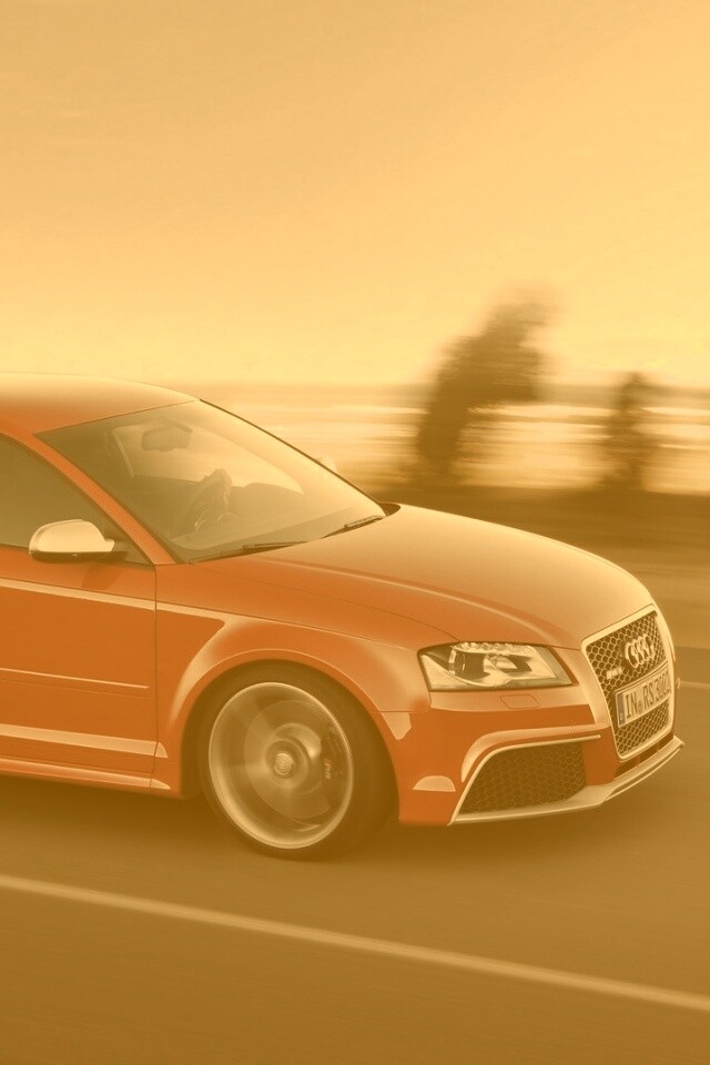 Красная Audi модели RS3 на дороге обои