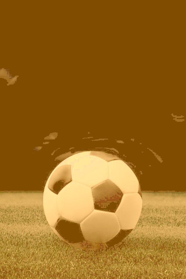 Футбольный мяч на темном поле обои