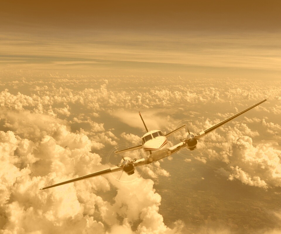Самолет над облаками обои