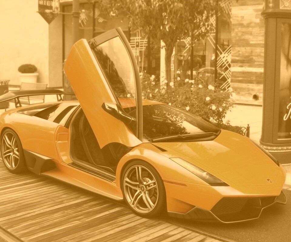 Оранжевая ламборджини на улице обои
