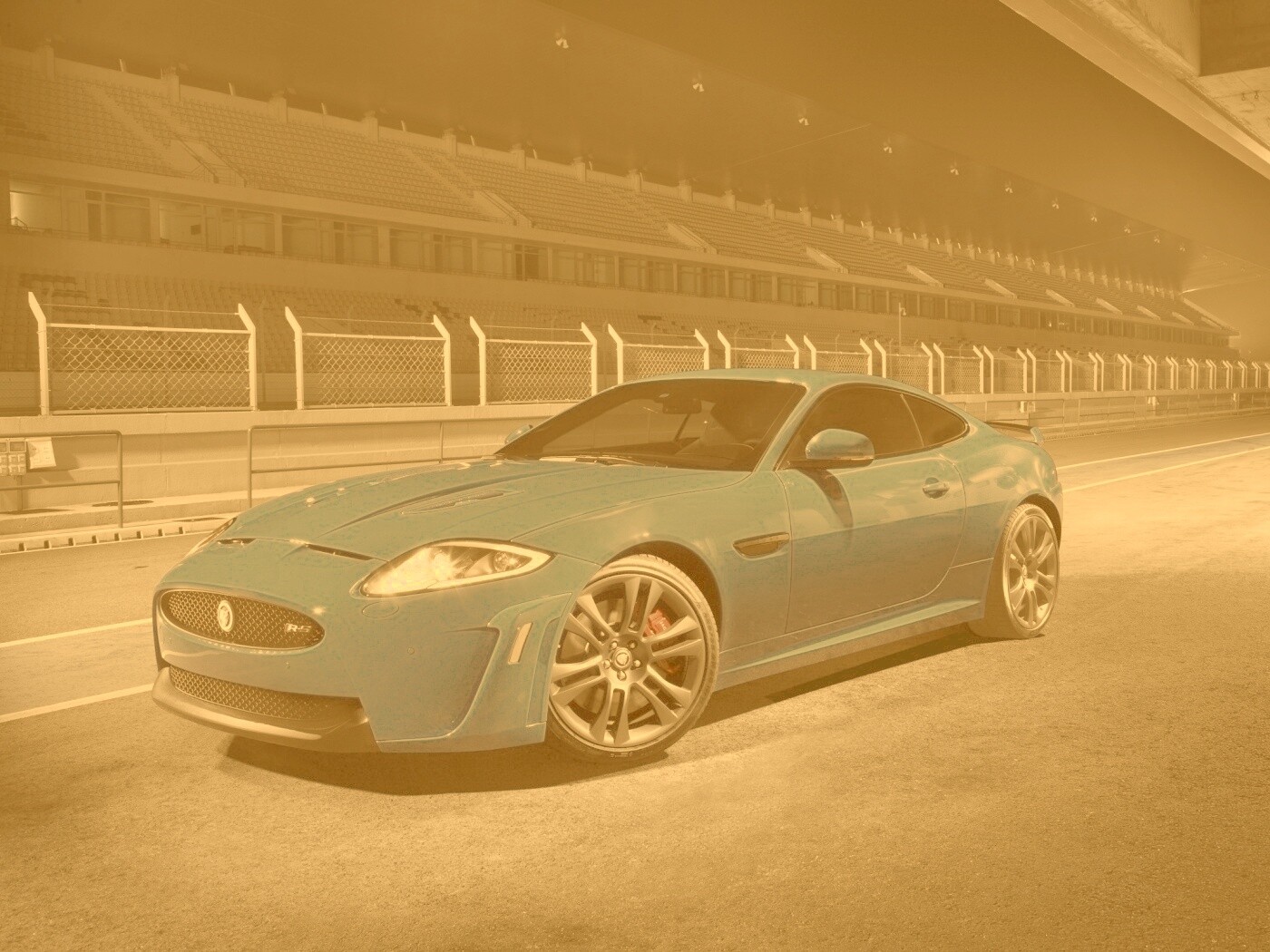 Синий спорткар на гоночном треке обои