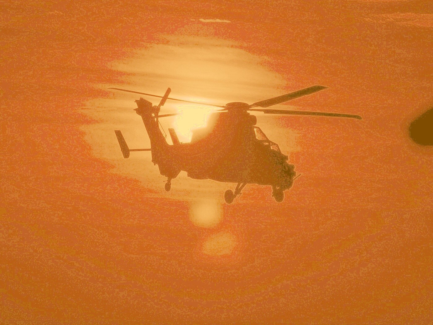 Вертолет в лучах закатного солнца обои