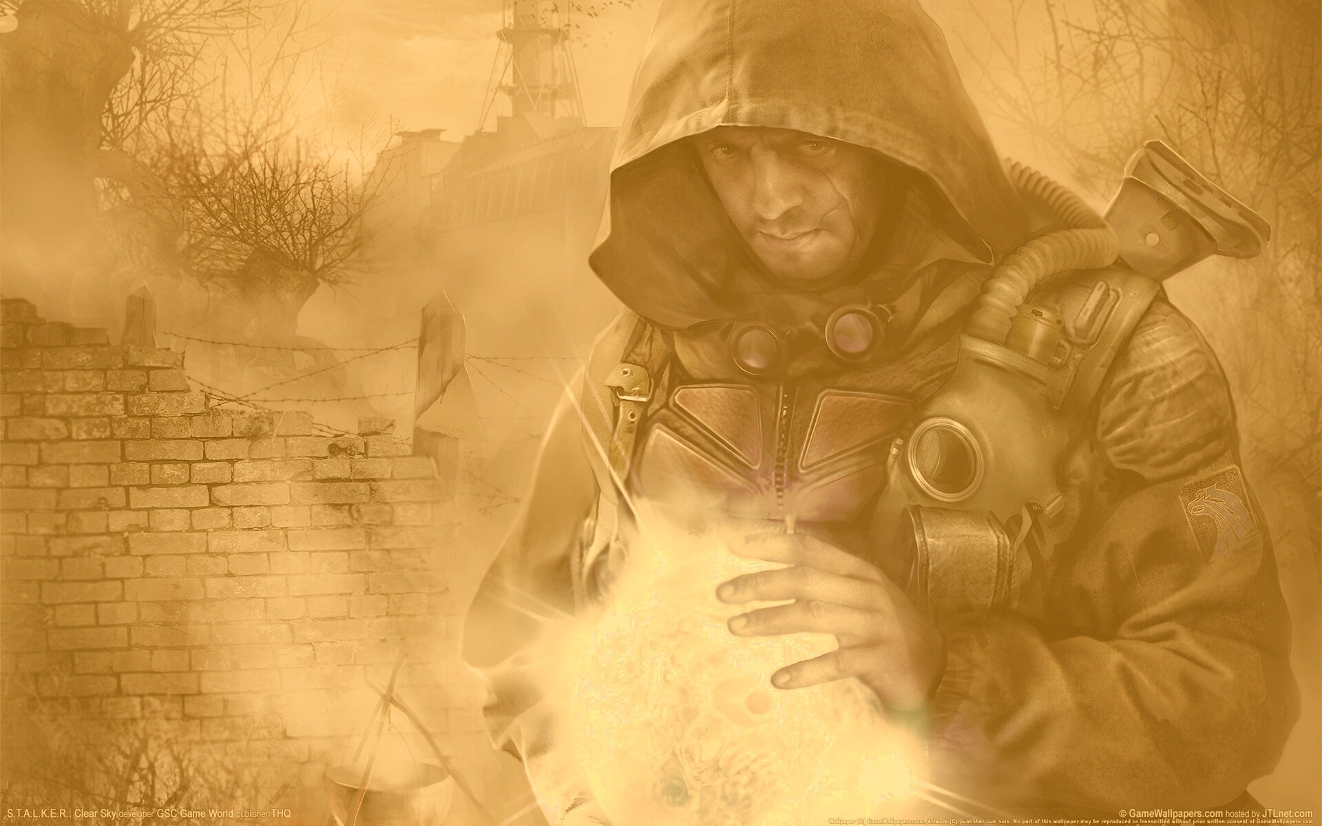 Сталкер с энергетическим артефактом в руках обои