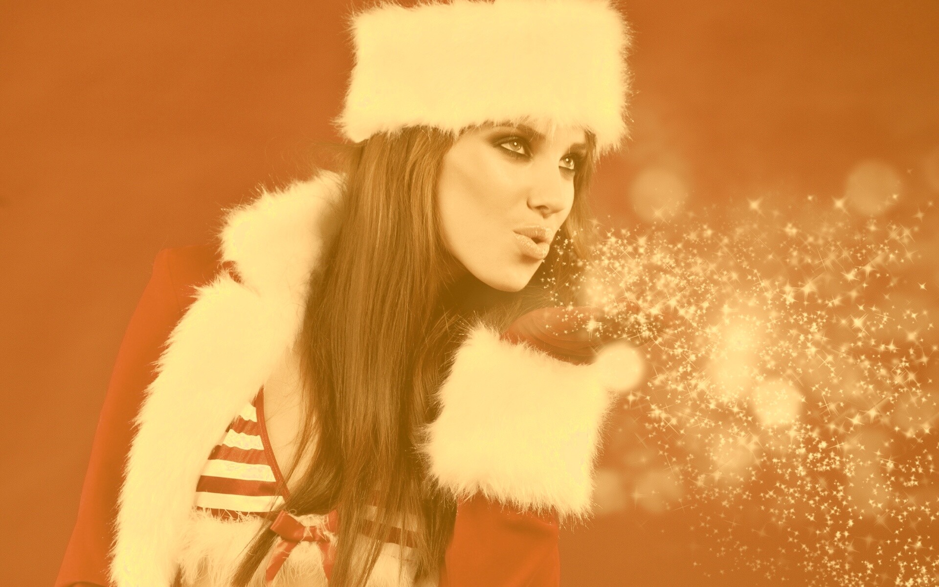 Снегурочка дует на снежинки обои