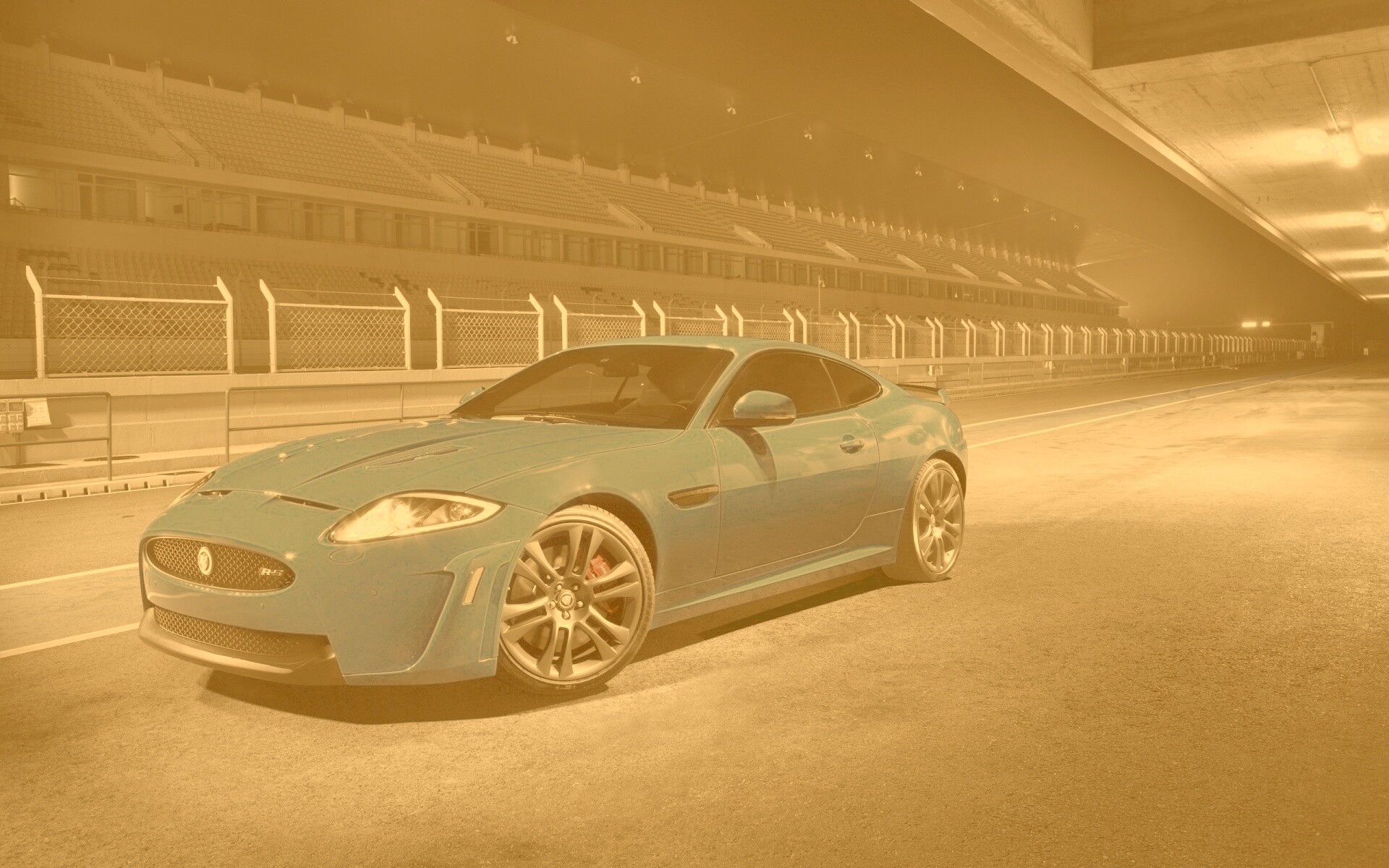 Синий спорткар на гоночном треке обои