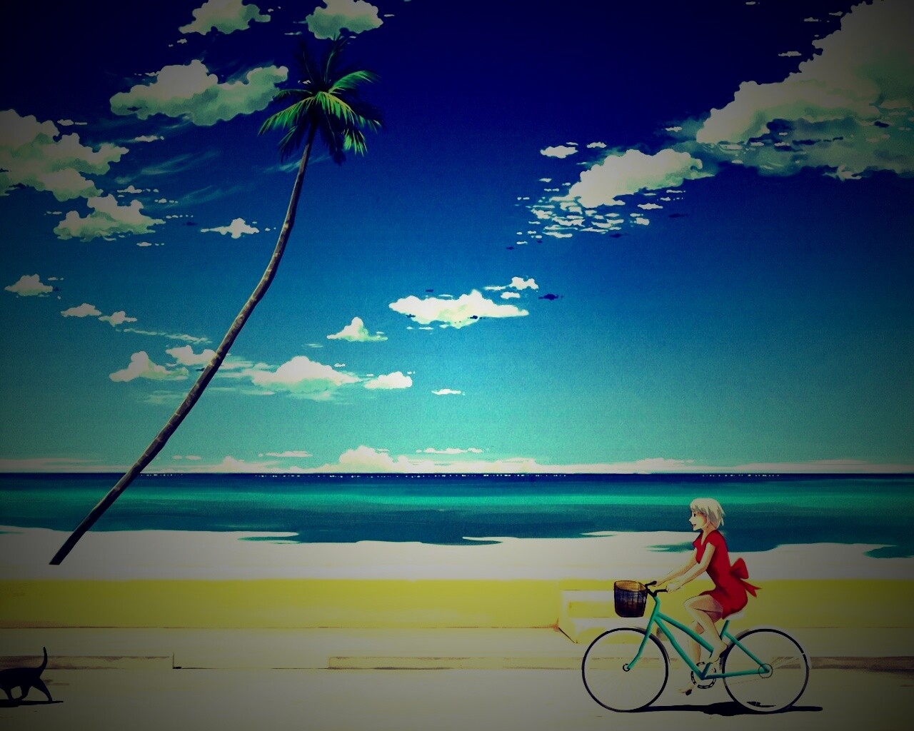 Девушка едет на велосипеде вдоль берега обои