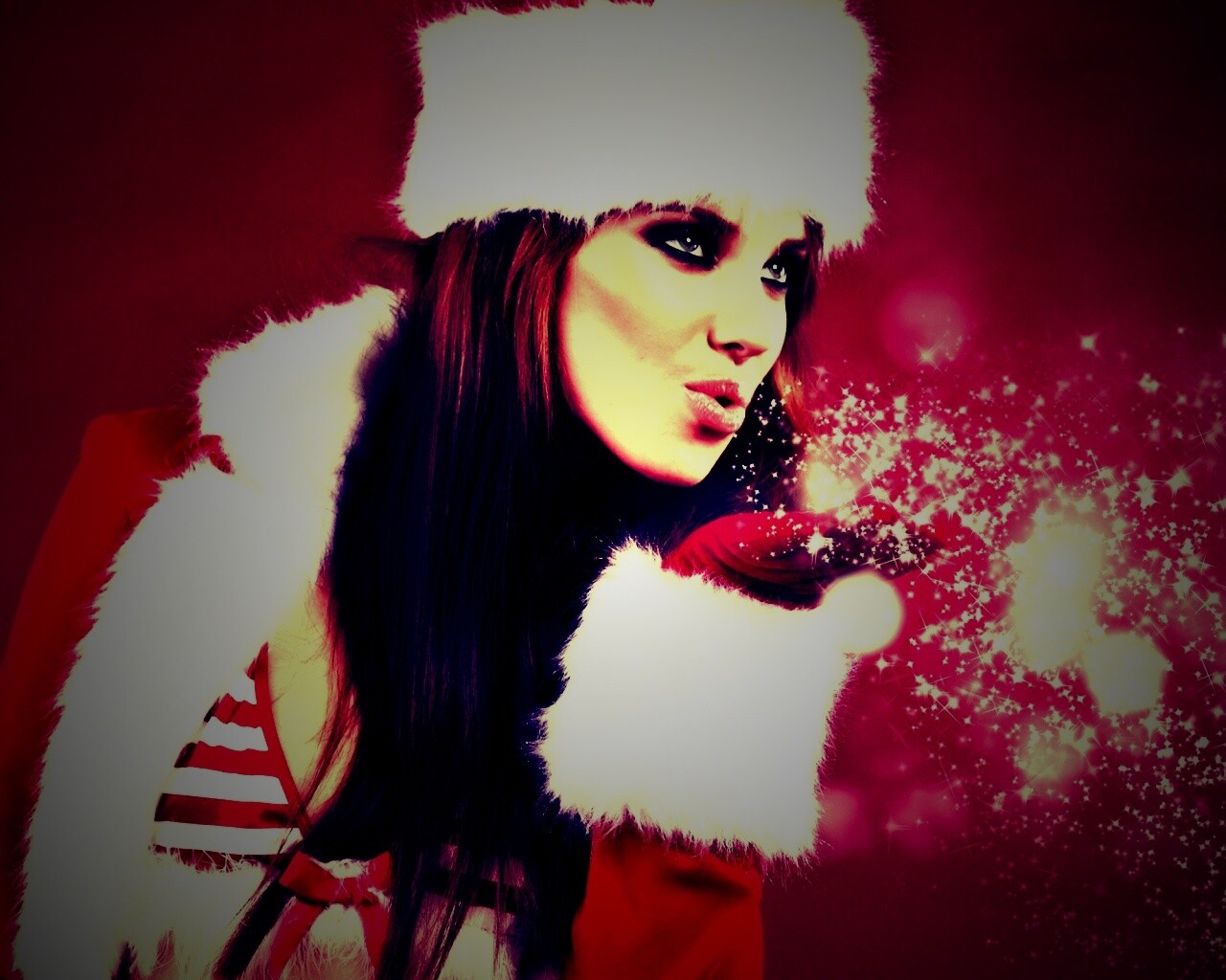 Снегурочка дует на снежинки обои