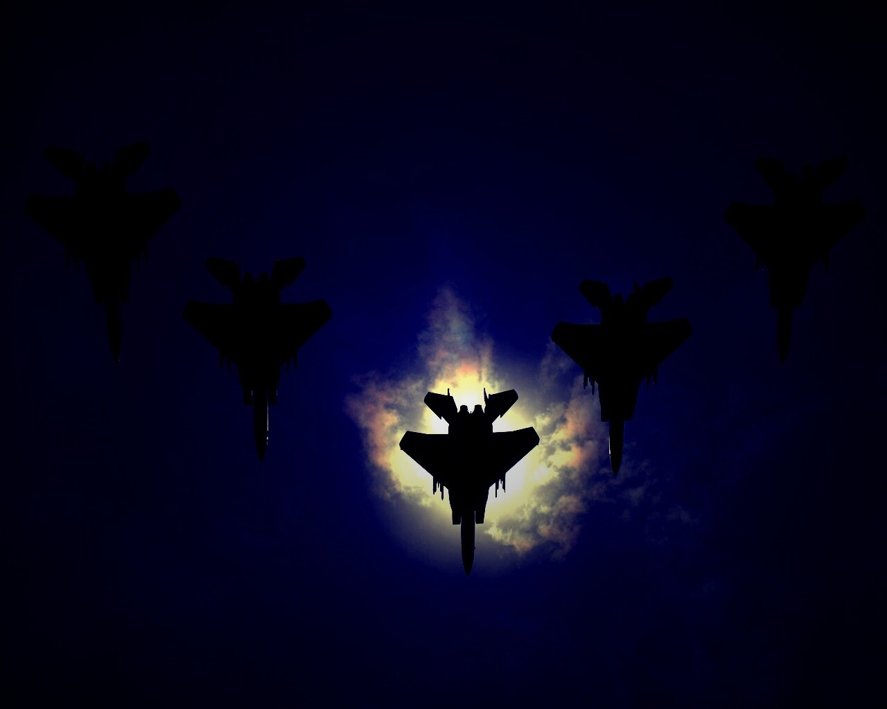 Ряд истрибителей на фоне солнца обои