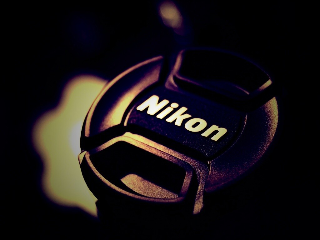Крышечка от объектива Nikon обои