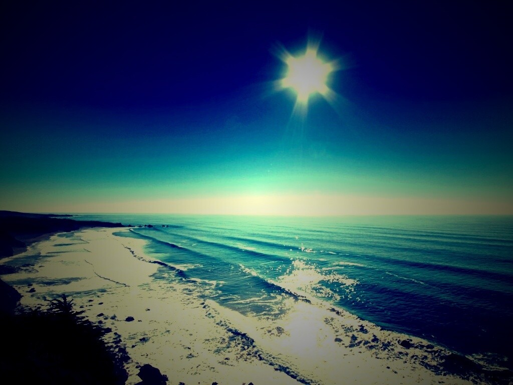 Солнце над морем обои