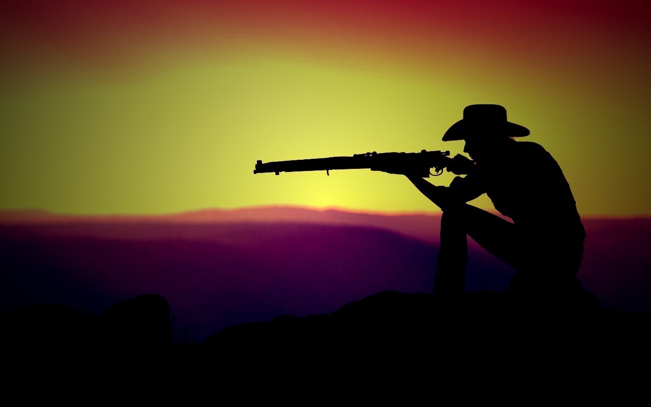 Стрелок на закате обои