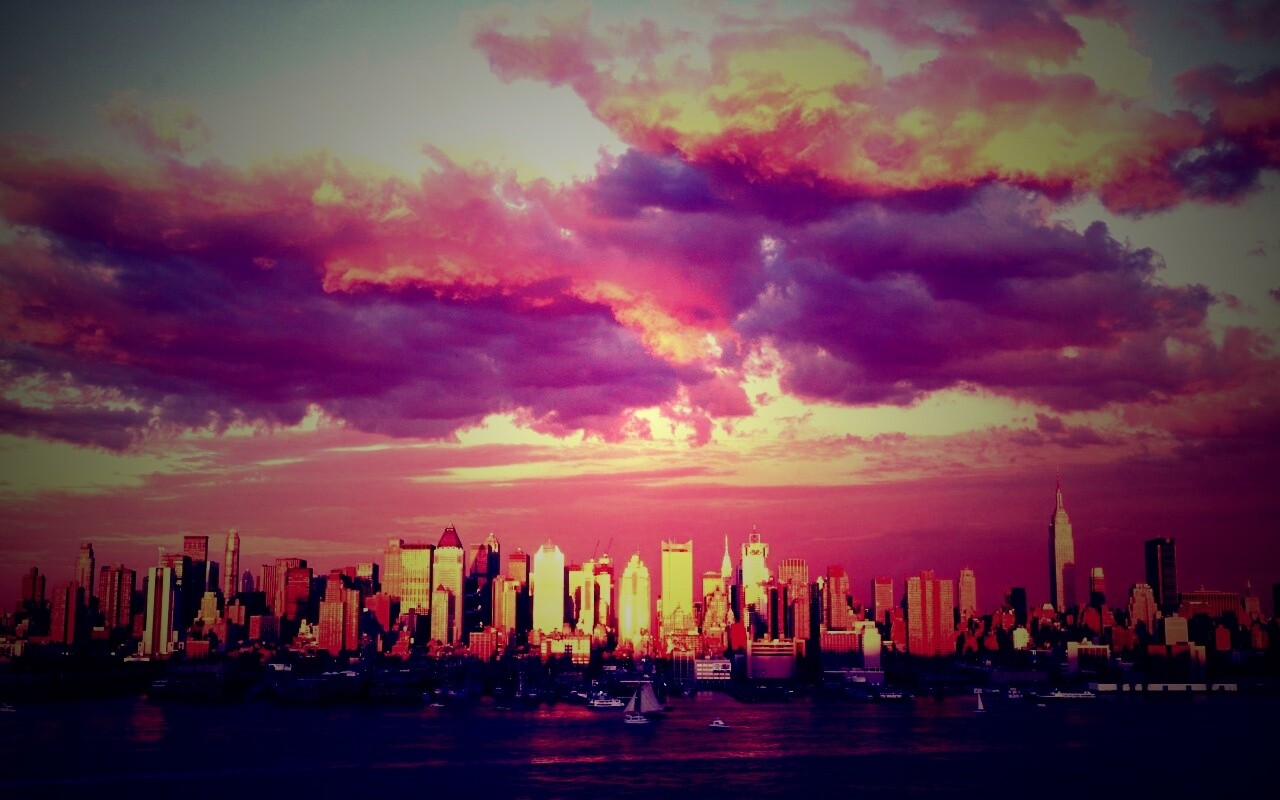 Панорама города на закате обои