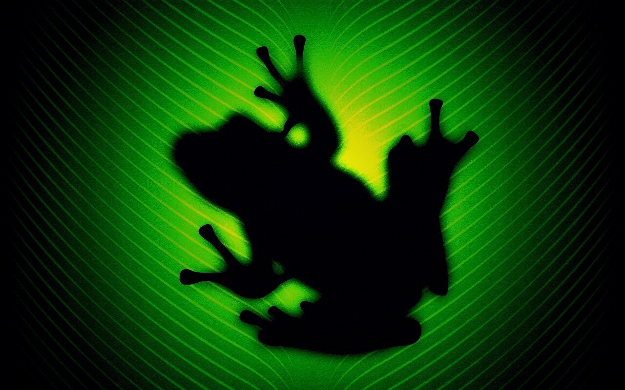 Силуэт лягушки просвечивает сквозь зеленый лист обои