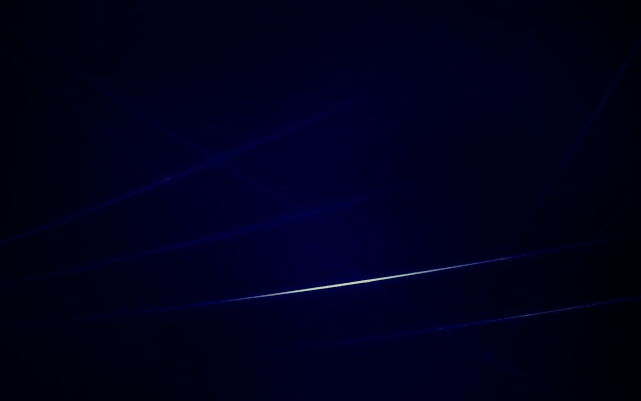 Лучи света на графитовом фоне обои