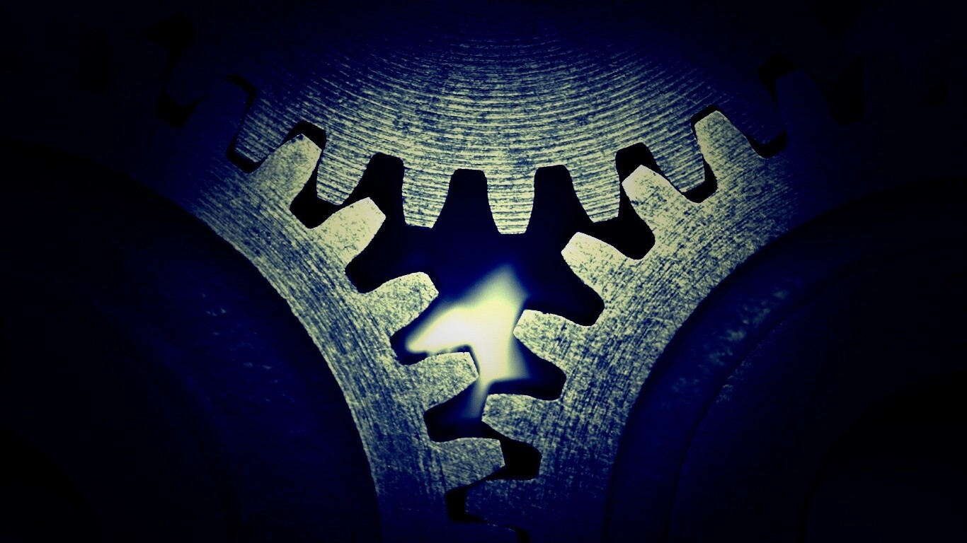 Три сцепленных шестерни обои