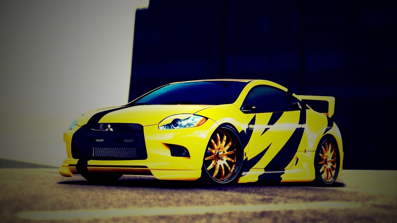 Mitsubishi жёлтого цвета с черными полосами обои