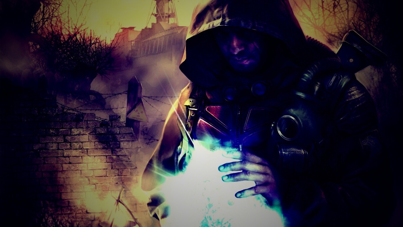 Сталкер с энергетическим артефактом в руках обои