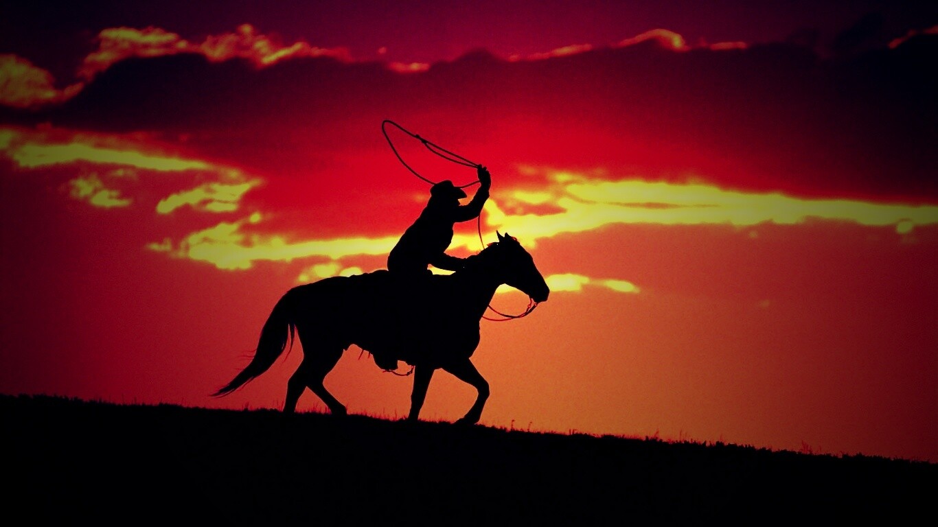 Силуэт ковбоя на закате обои