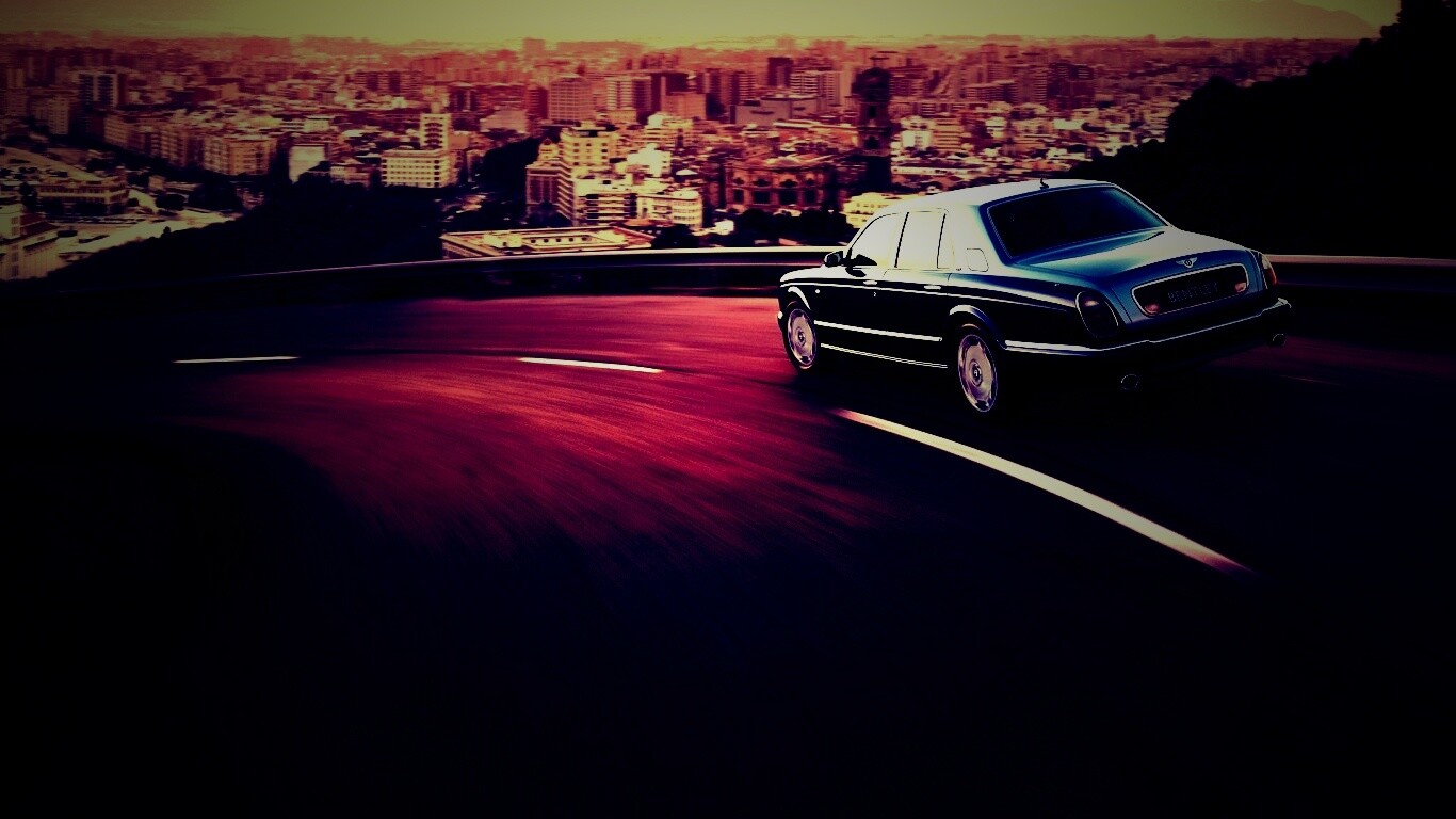 Черный Бентли на повороте обои