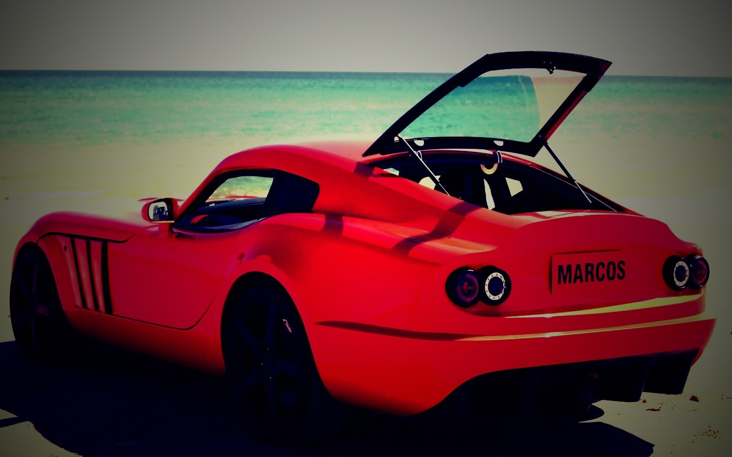 Marcos на пляже обои