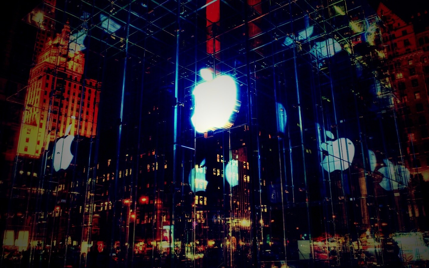 Отражение логотипа Apple в стеклянном здании обои