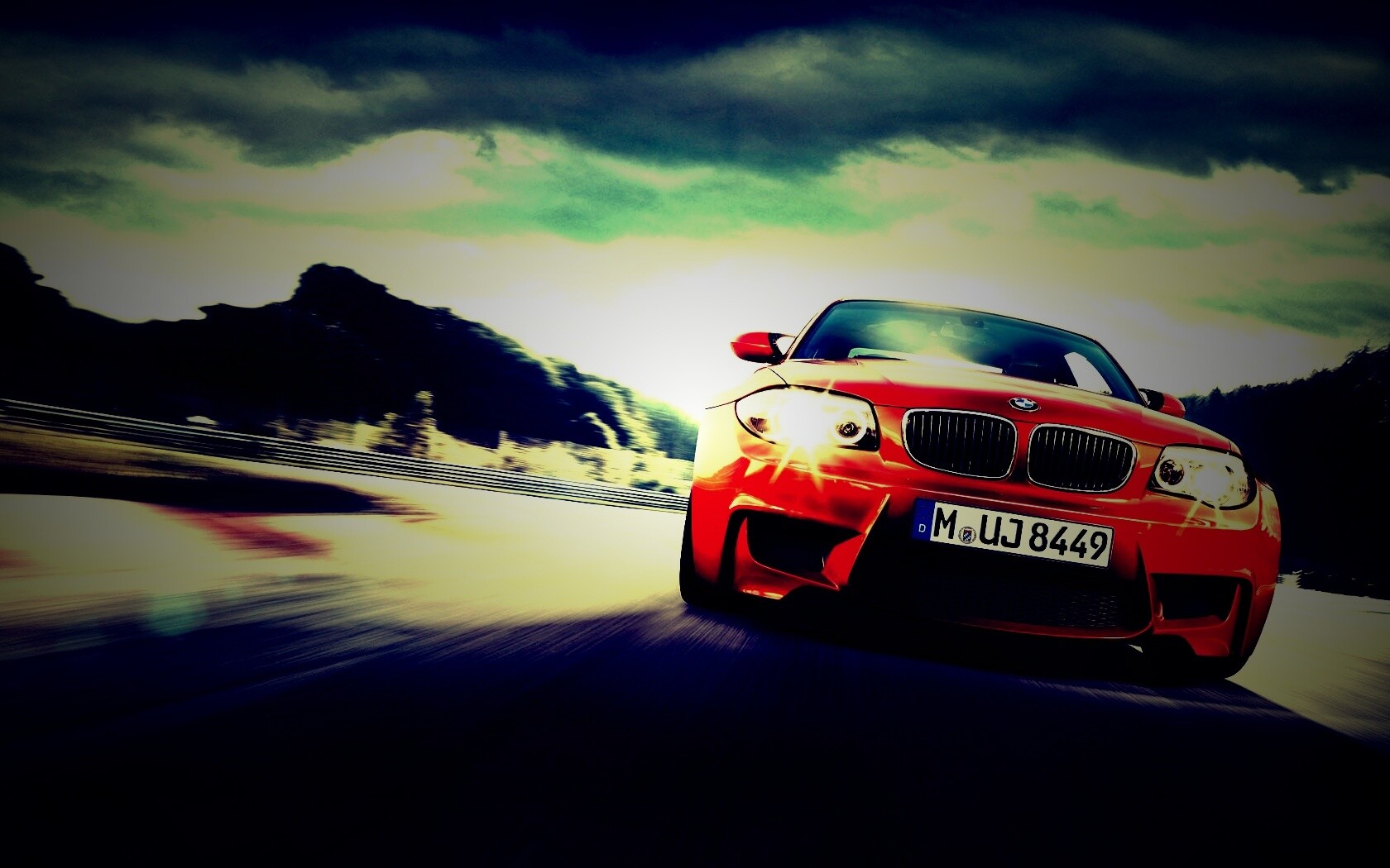 Оранжевый BMW M1 Coupe на треке обои