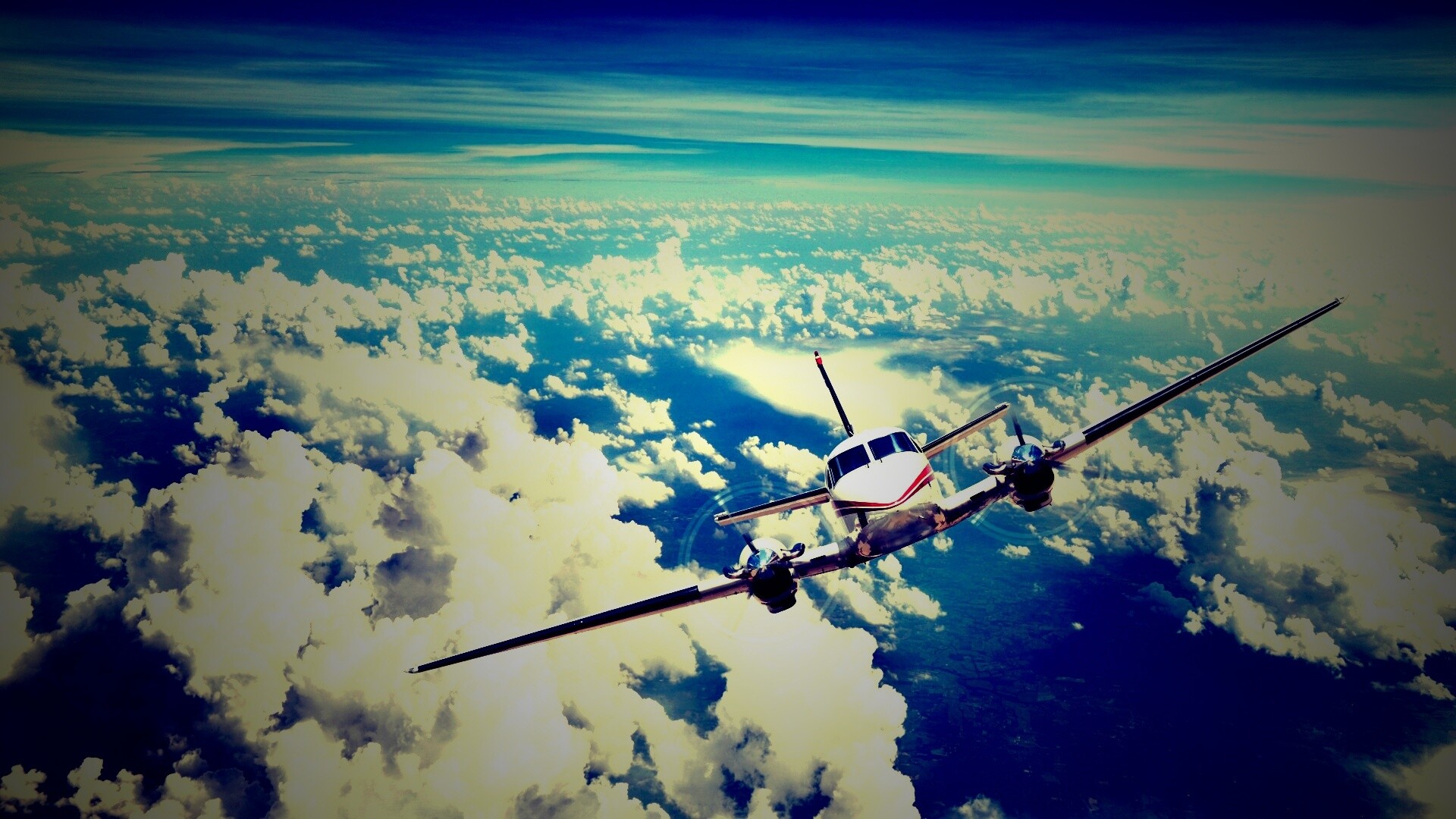 Самолет над облаками обои