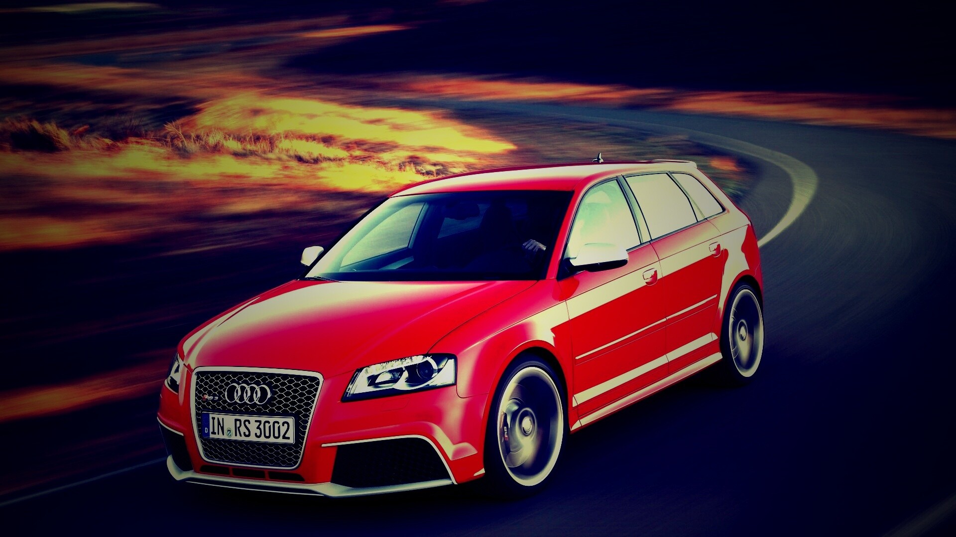 Красная ауди мчится по извилистой дороге обои