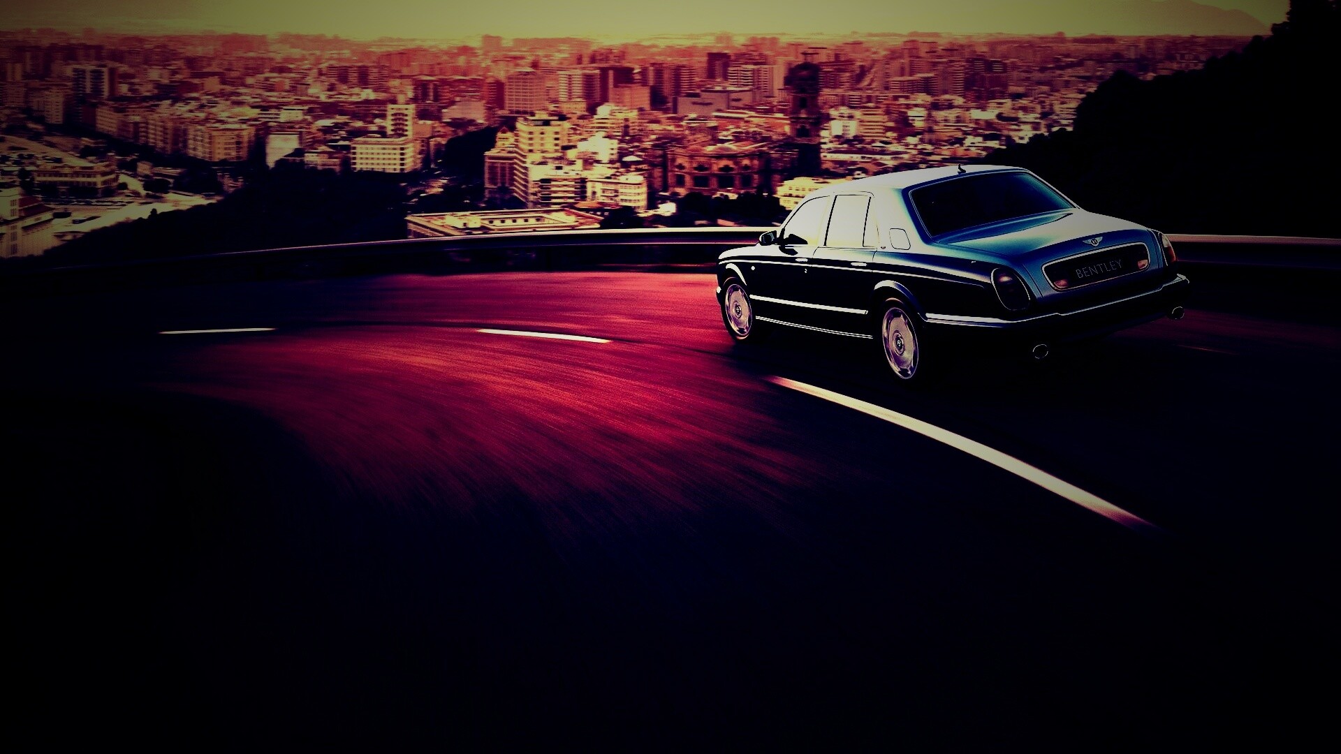 Черный Бентли на повороте обои