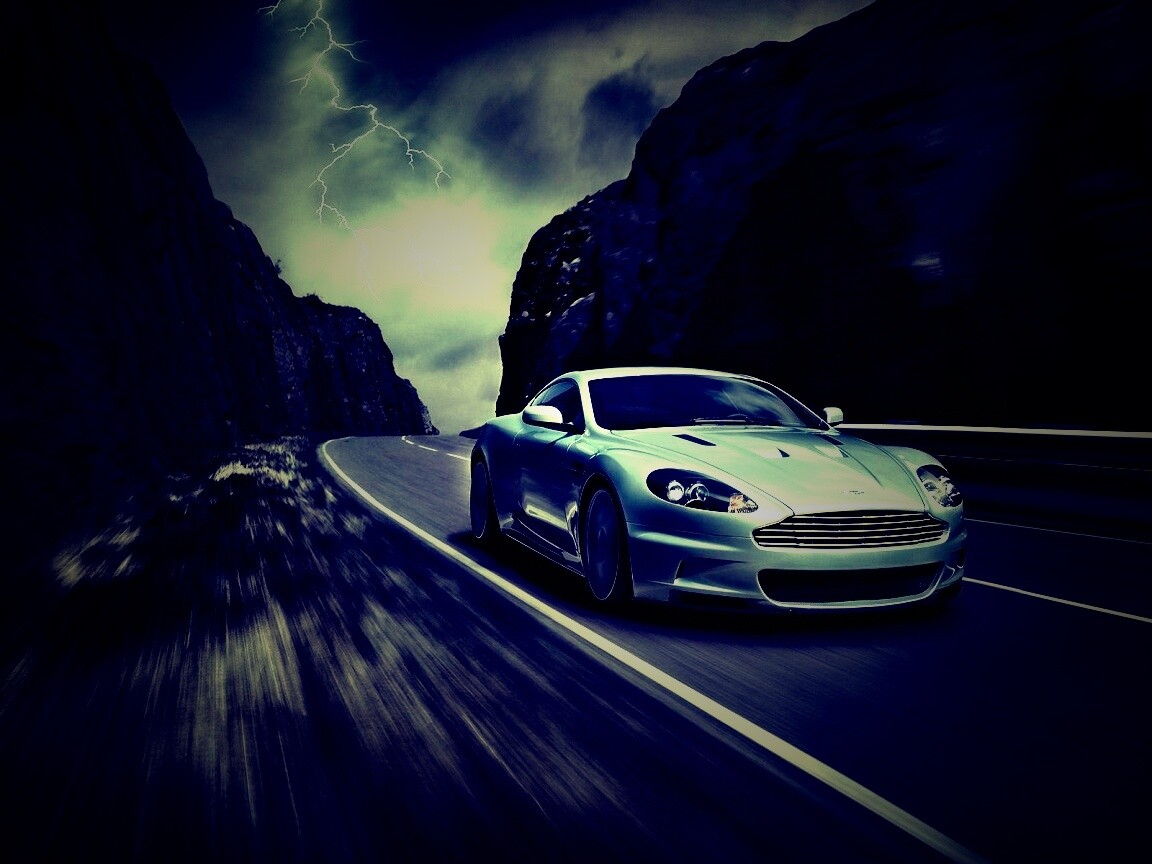 Астон мартин на горной дороге обои