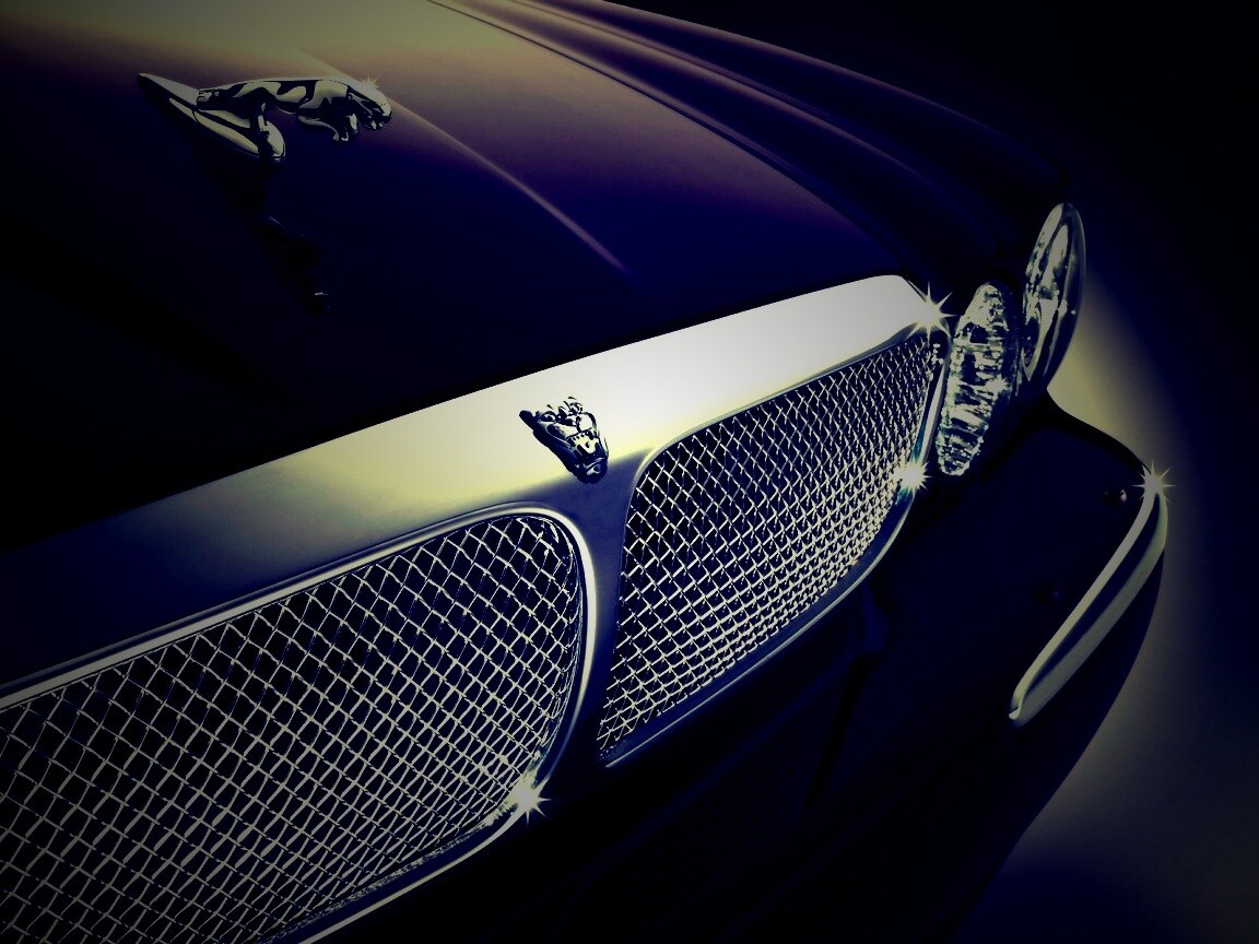 Капот и эмблема Ягуара обои