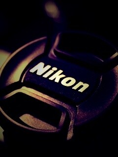 Крышечка от объектива Nikon обои