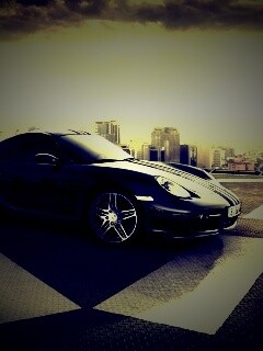 Порш на вертолетной площадке обои