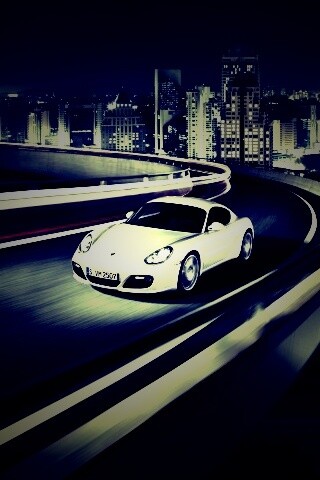 Черный и белый Porsche на автомагистрале. обои