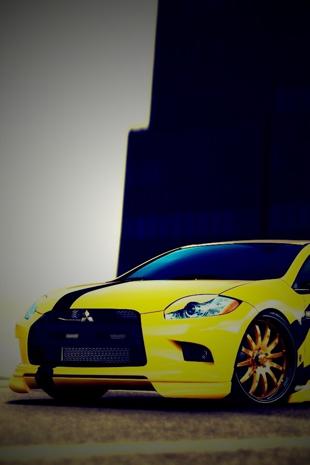 Mitsubishi жёлтого цвета с черными полосами обои