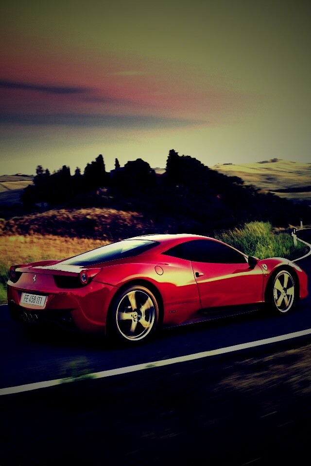Красная феррари на извилистой дороге обои