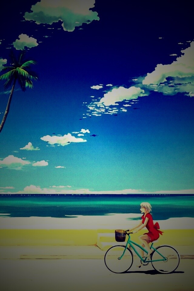 Девушка едет на велосипеде вдоль берега обои