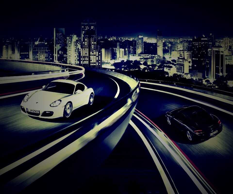 Черный и белый Porsche на автомагистрале. обои