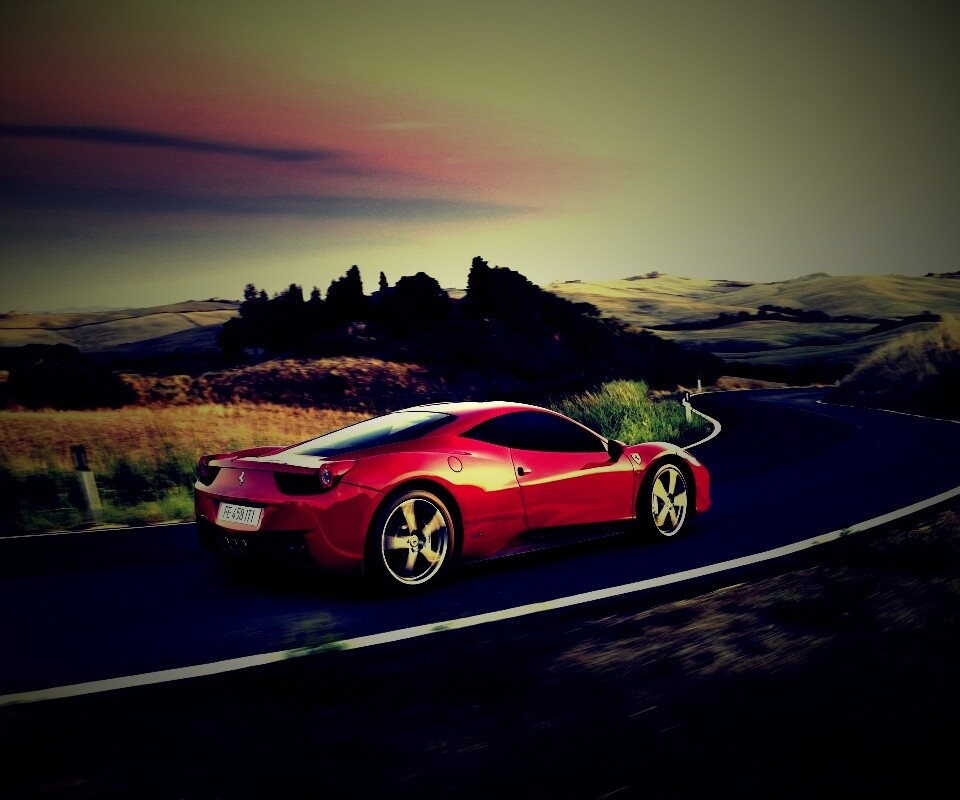 Красная феррари на извилистой дороге обои