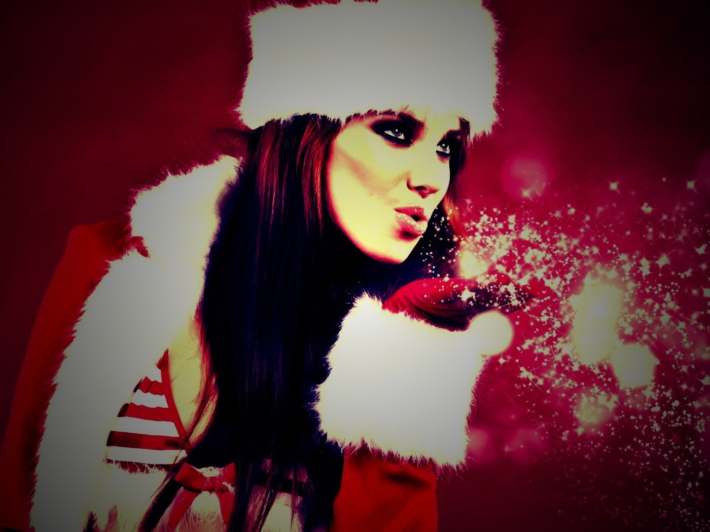 Снегурочка дует на снежинки обои