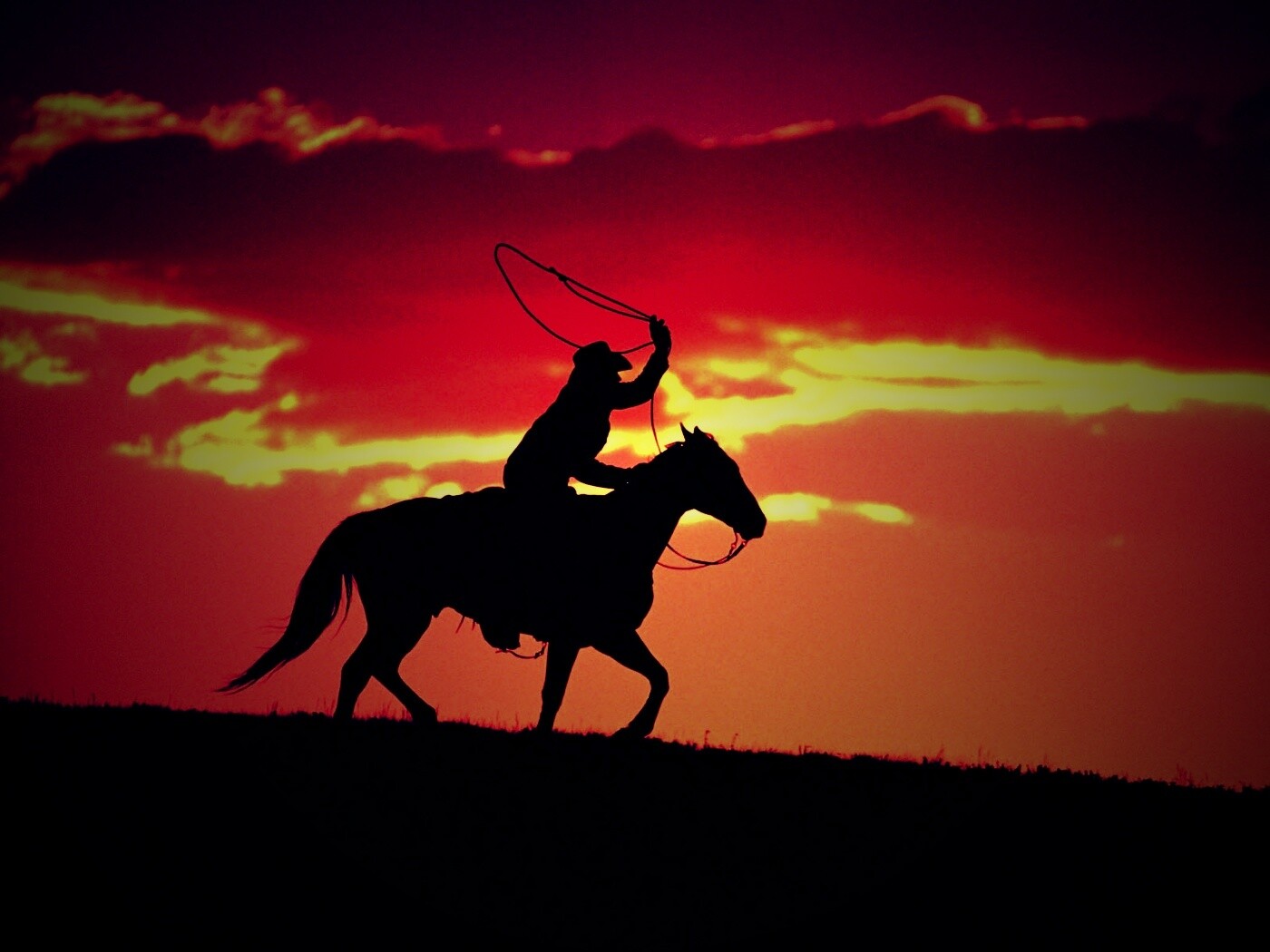 Силуэт ковбоя на закате обои
