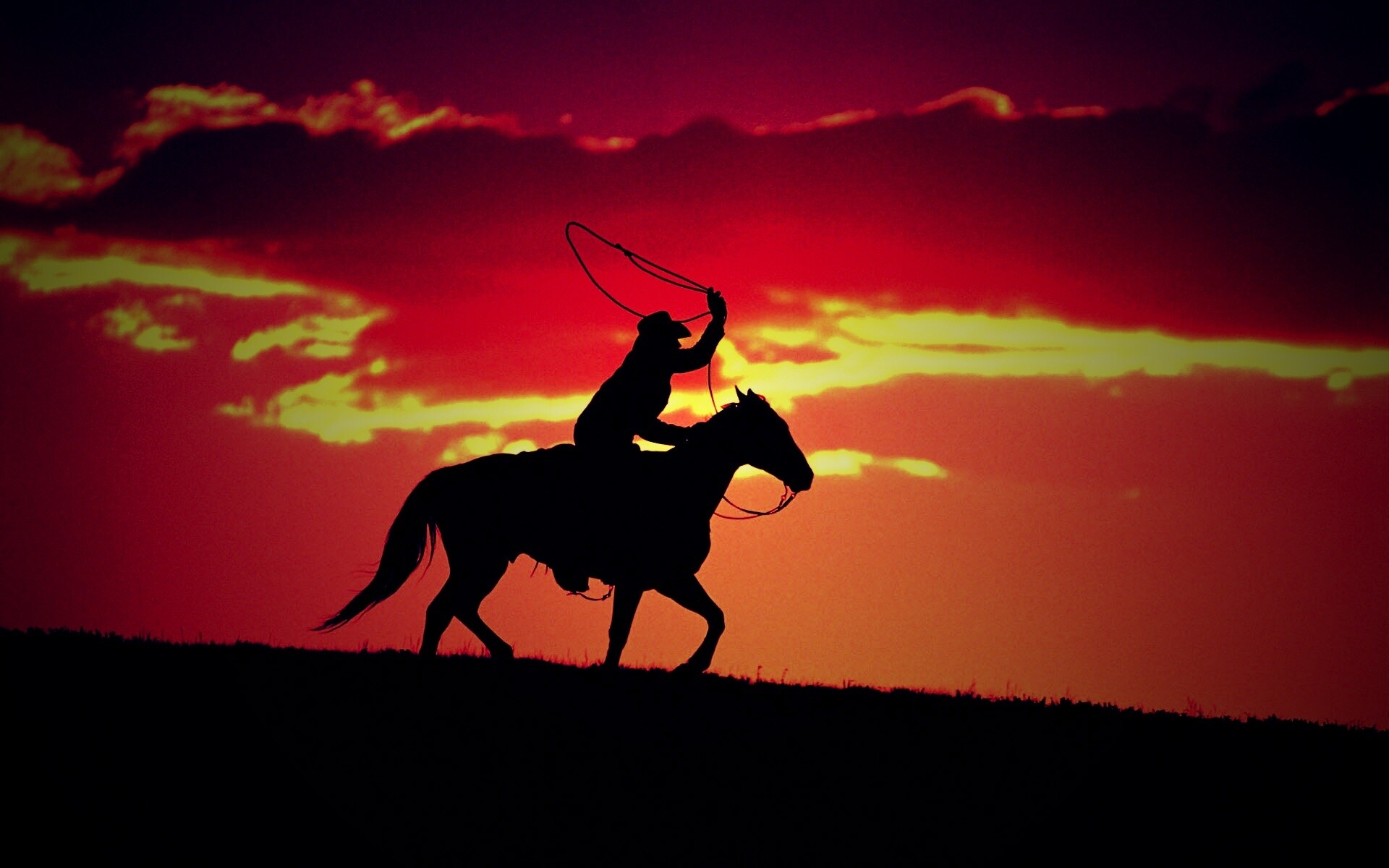 Силуэт ковбоя на закате обои