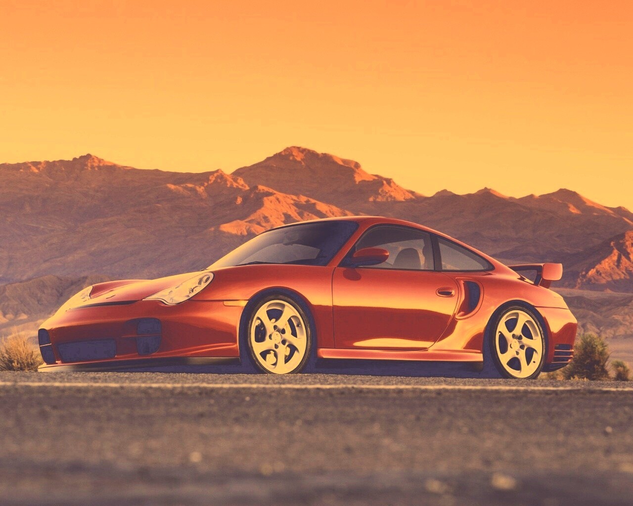 Красный Порше на фоне гор обои