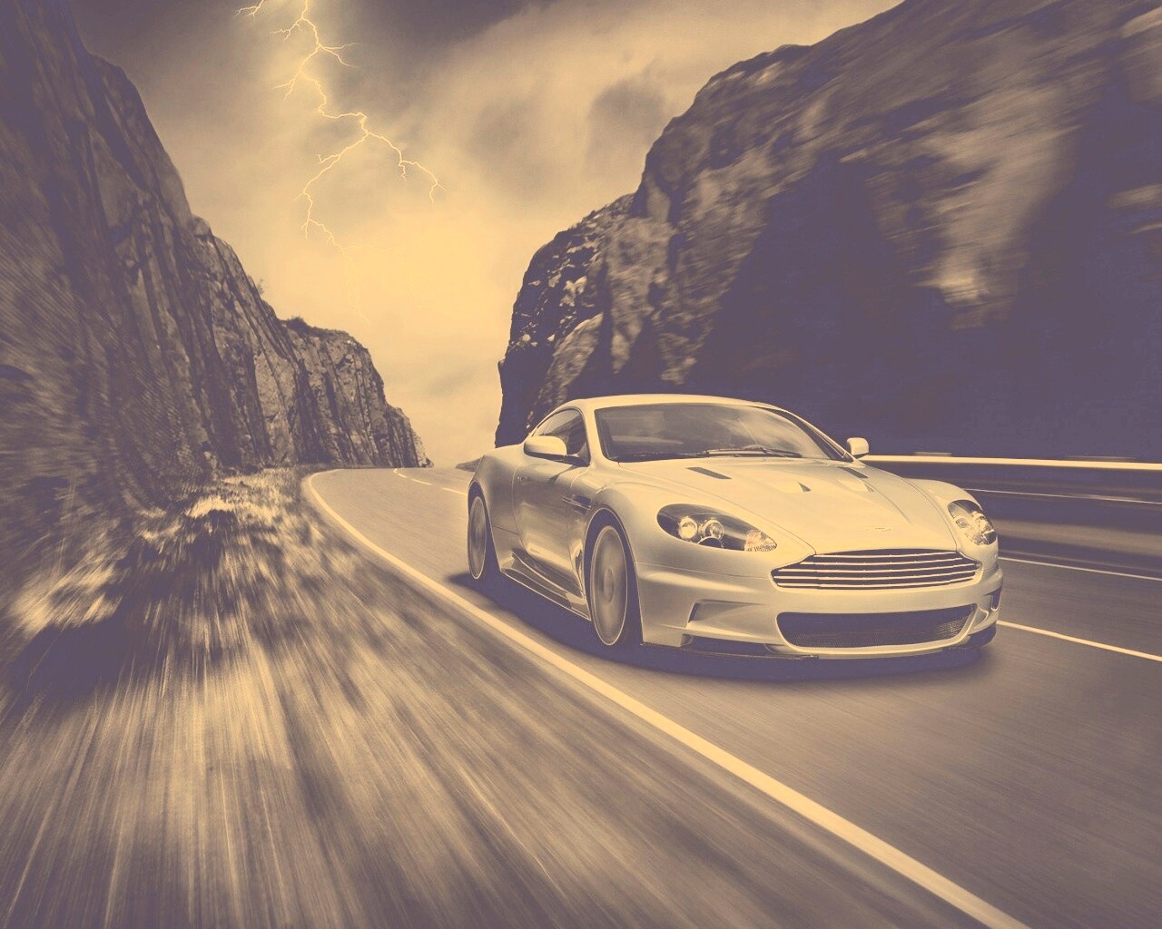 Астон мартин на горной дороге обои