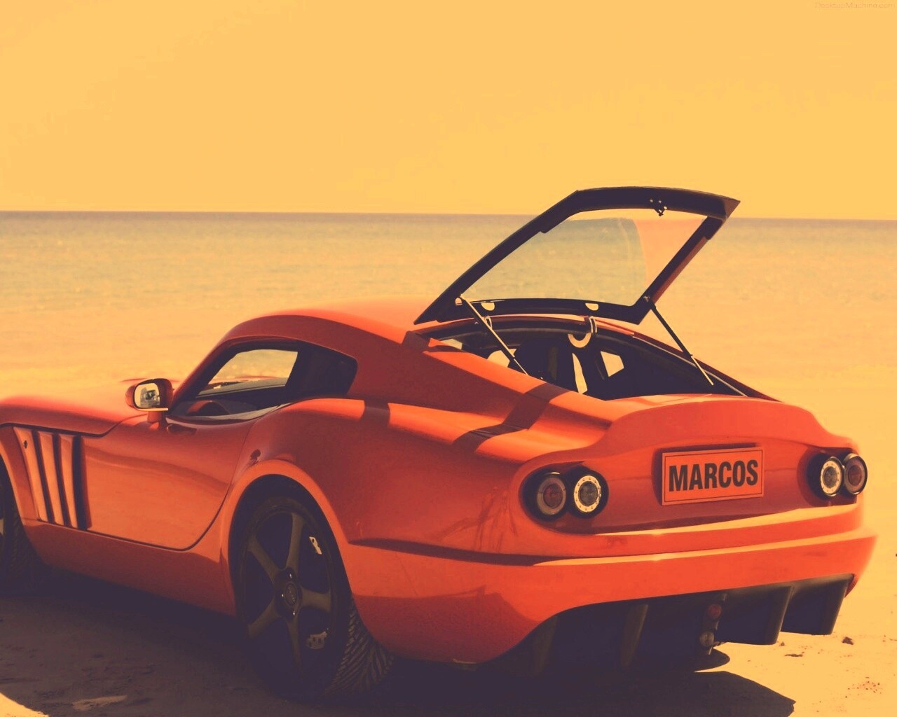 Marcos на пляже обои